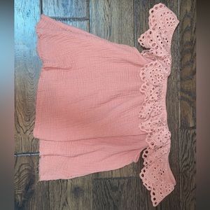 Pink off the shoulder or on shirt